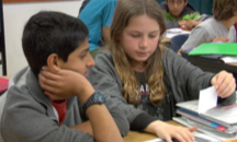 Two students working together on an activity